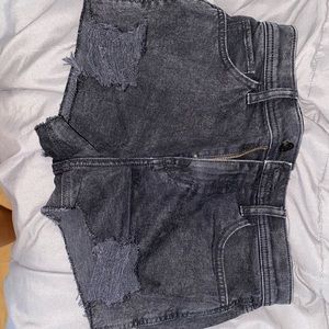 black ripped high waisted shorts